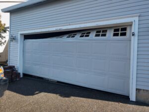 garage door destroyed by the opener
